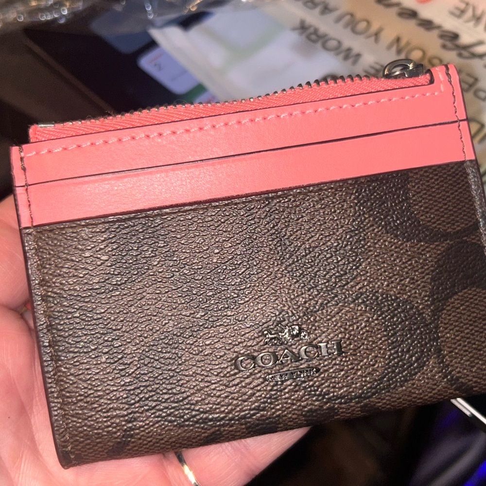 Coach card holder and coins zipper and keychain . Pink and brown cc printed .